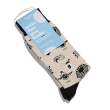Load image into Gallery viewer, Socks that Give Books  (Ivory Hieroglyphics): Medium