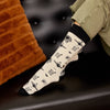 Conscious Step - Socks that Give Books  (Ivory Hieroglyphics): Medium